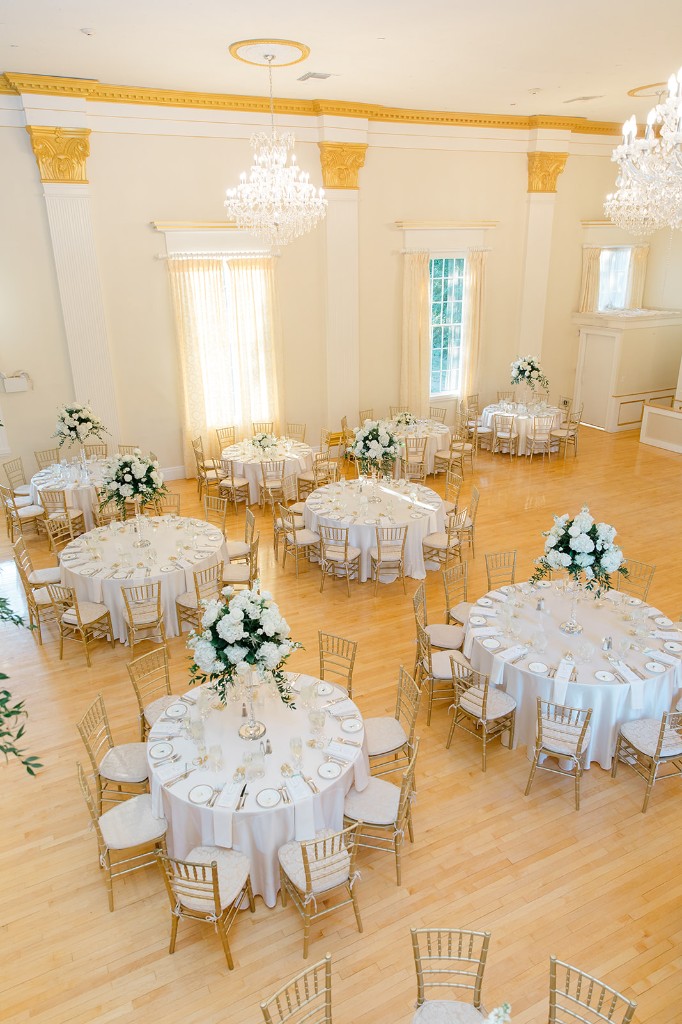 Grand ballroom overhead view with white and gold decor at The Commons 1854