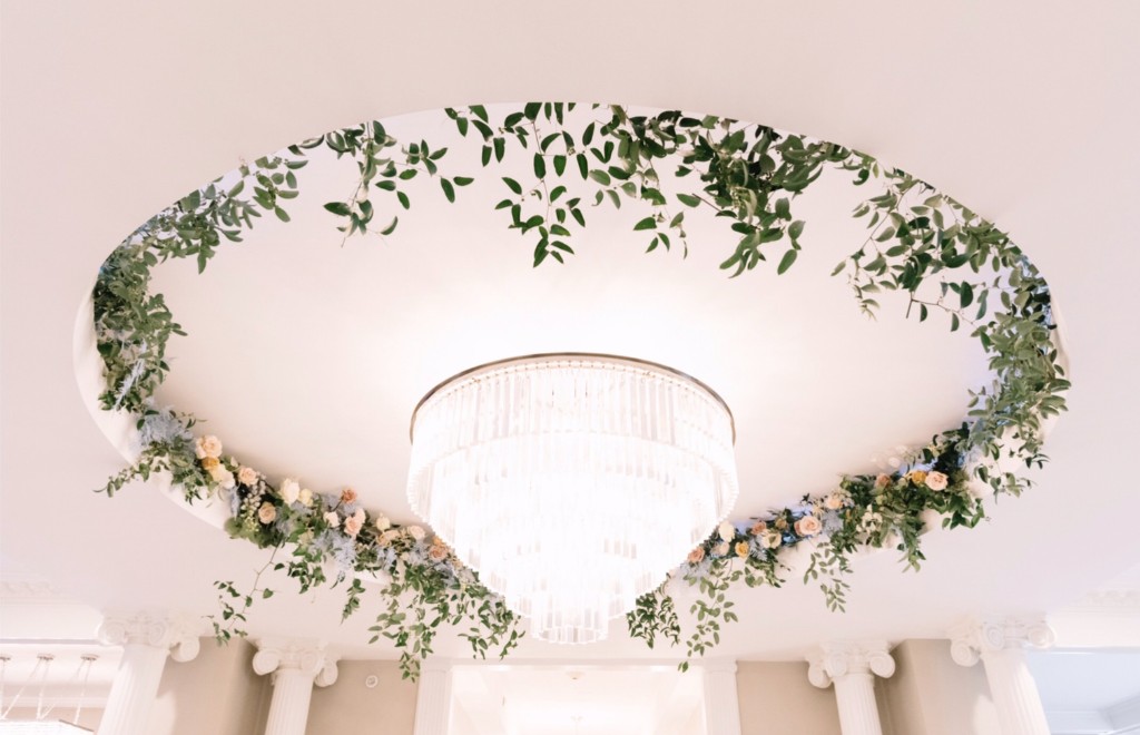 Rotunda chandelier with holiday garland at The Commons 1854