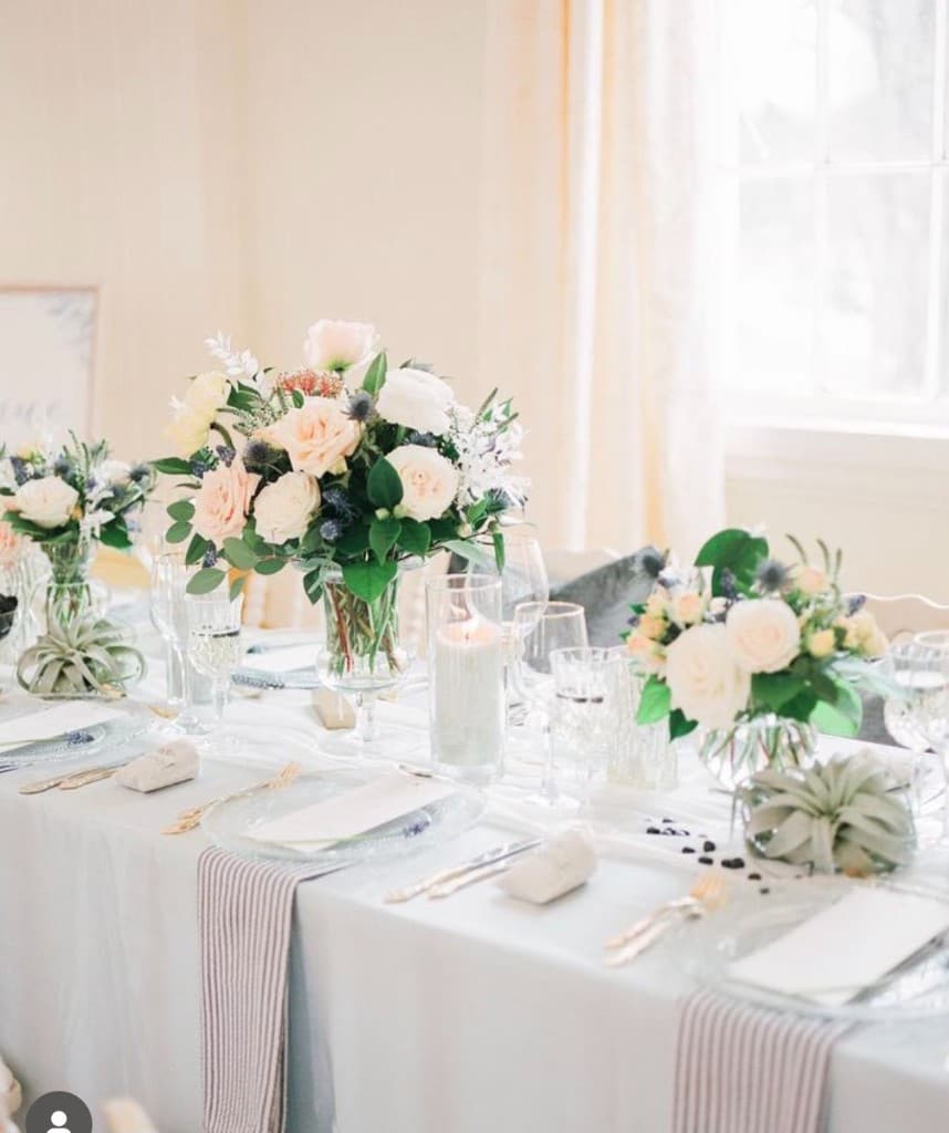 Tablescape with florals and candles at The Commons 1854