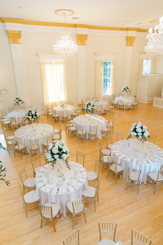 Grand ballroom overhead view with white and gold decor at The Commons 1854