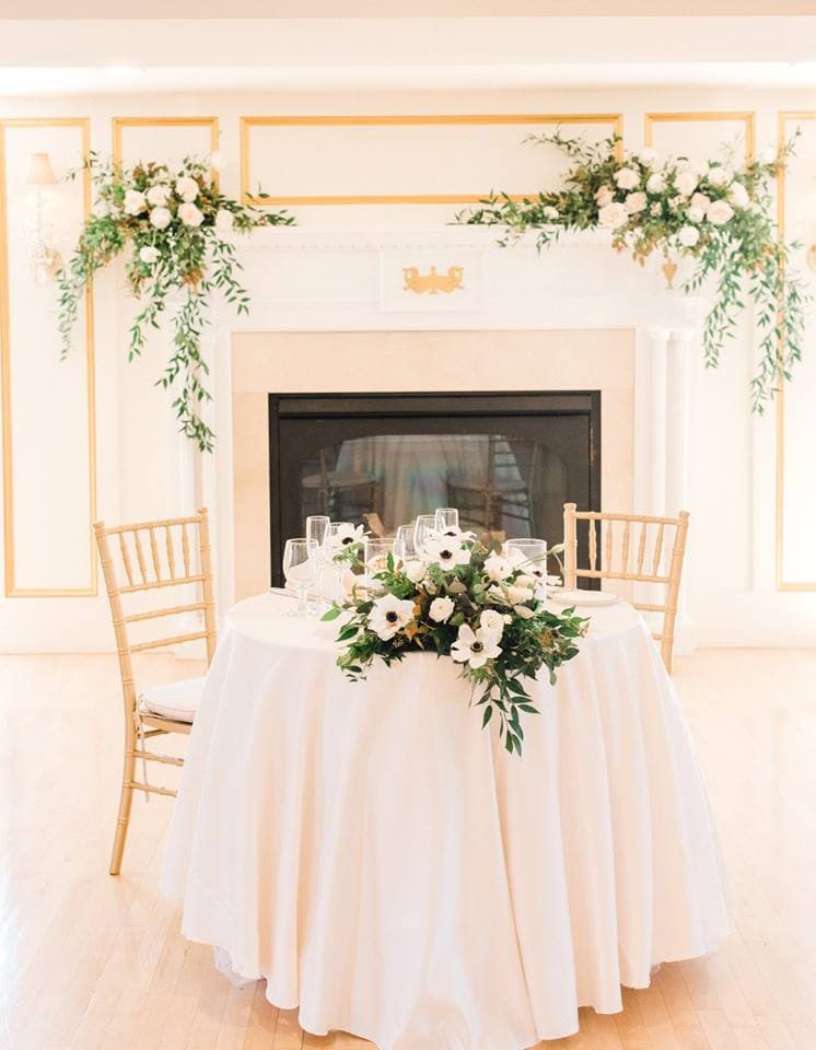 Elegant sweetheart table at The Commons 1854 reception