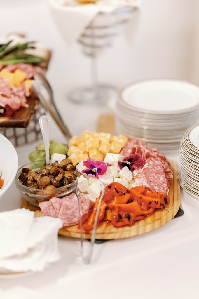 Charcuterie board with flowers at The Commons 1854